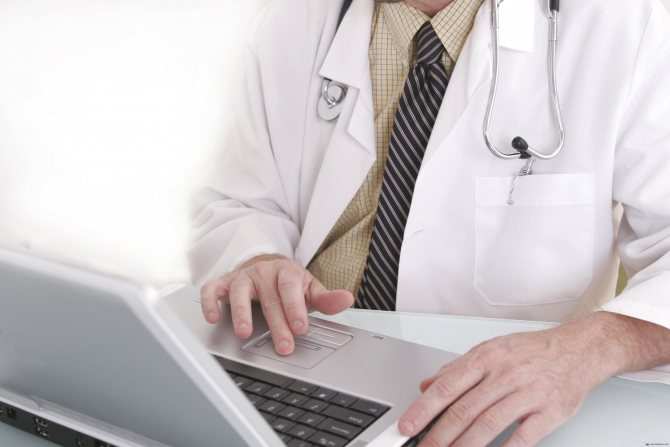 Doctor at laptop
